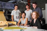 University of Newcastle students and mentor Jiri Loew with some of the group's designs for Dungog.