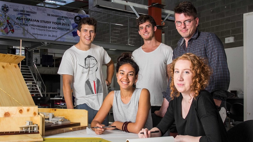 University of Newcastle students and mentor Jiri Loew with some of the group's designs for Dungog.