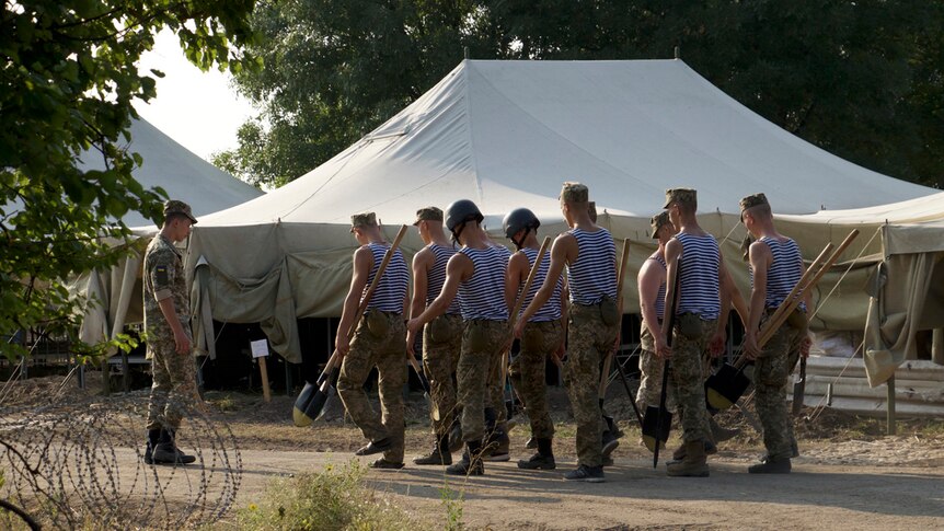 Young Ukrainians training at a field camp for navy cadets.
