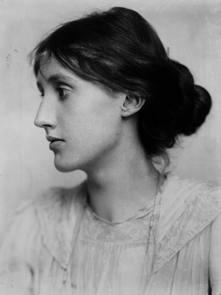 Black and white photo from 1902, showing side profile of young woman in her 20s, Victorian era hair and blouse.