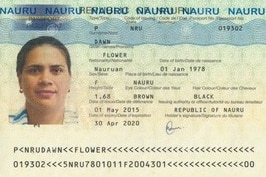 Front pages of a Nauruan passport are displayed with a woman's face and the words "specimen only".