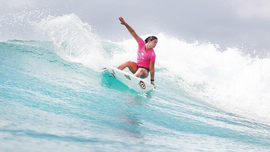 Tyler Wright catches a wave on her way to a semi-final win
