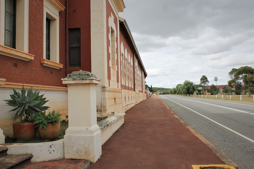 Exterior of old building on street