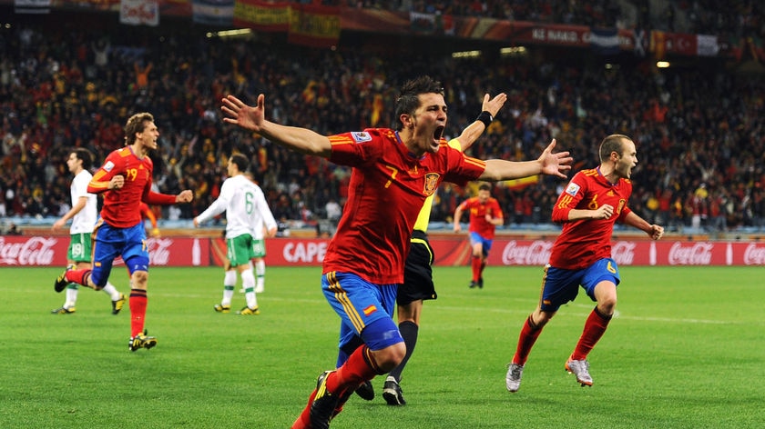 Star performer ... David Villa celebrates scoring the opening goal against Portugal