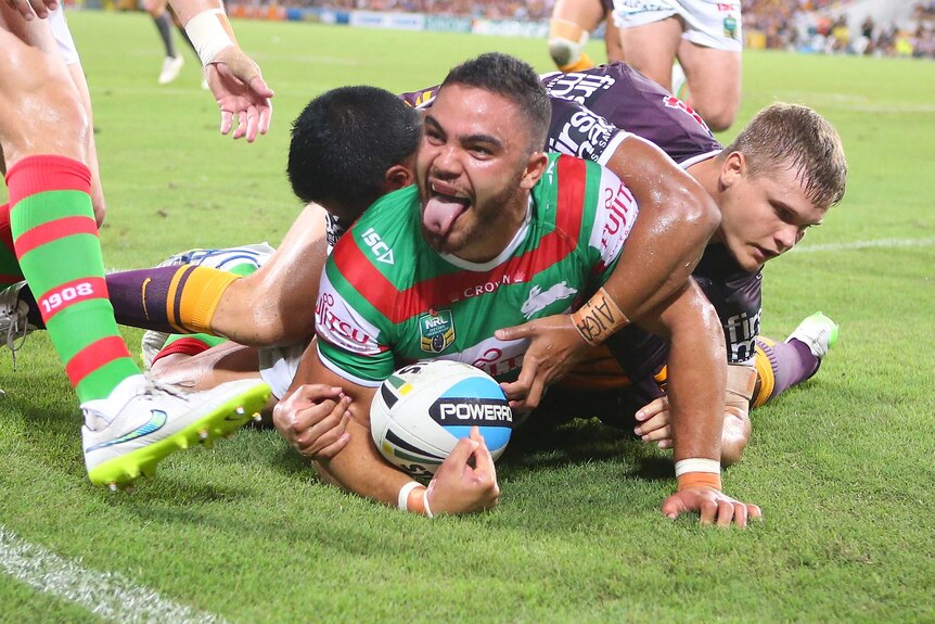 Dylan Walker celebrates the opening try for the Rabbitohs