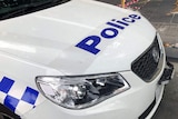 A police sign on a Victoria Police car.