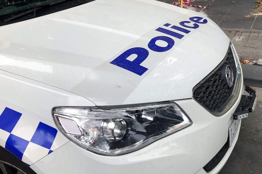 A police sign on a Victoria Police car.