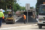Workers resurface a section of North East Road