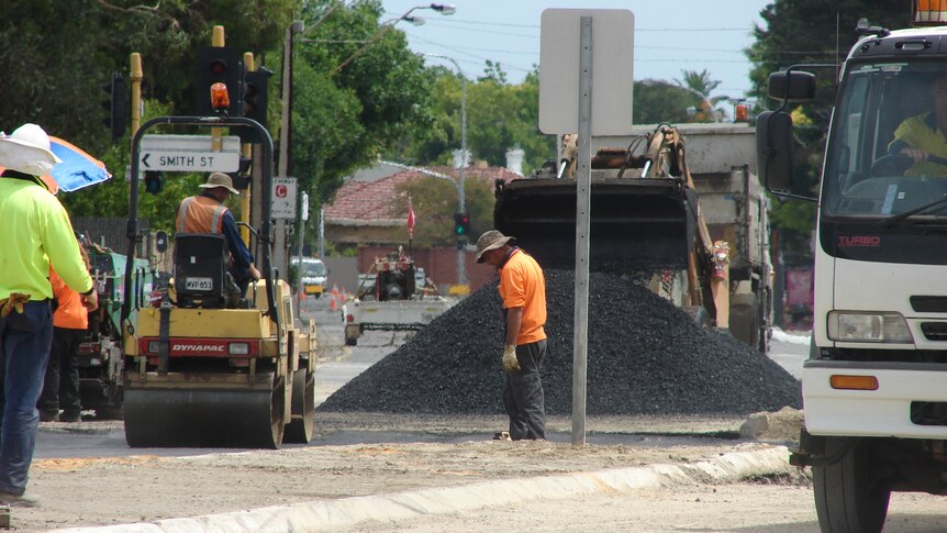 Workers resurface a section of North East Road