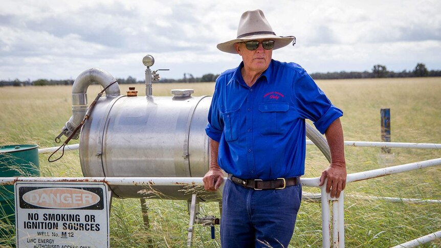 Toby Trebilco stands next to one of the Linc Energy monitoring bores located on his property.