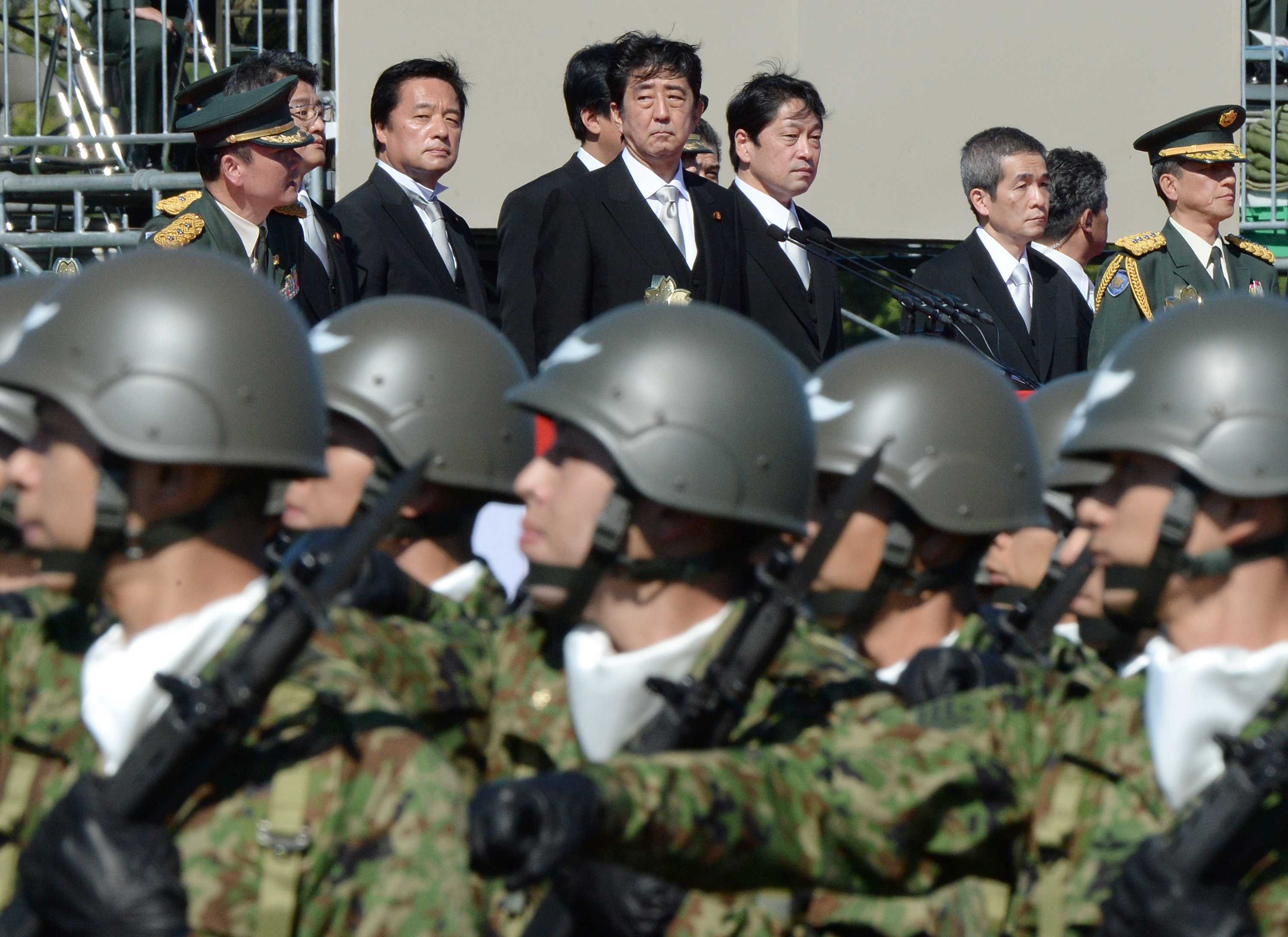 Japanese prime minister Shinzo Abe inspects Self-Defence Force troops