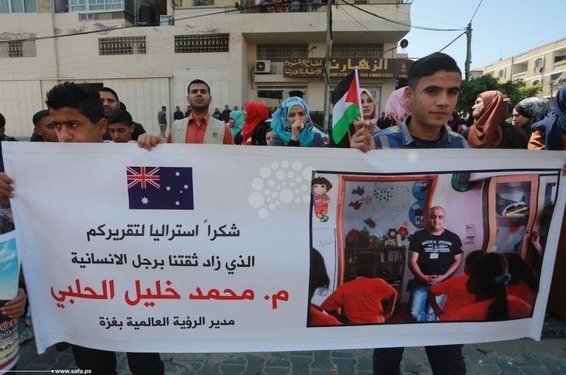 Friends and colleagues of World Vision employee Mohammad el Halabi rally in Gaza