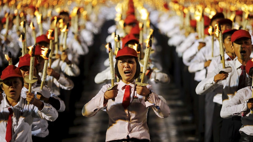 A girl performer cries during celebration of the 70th anniversary of the founding of the ruling Workers' Party of Korea