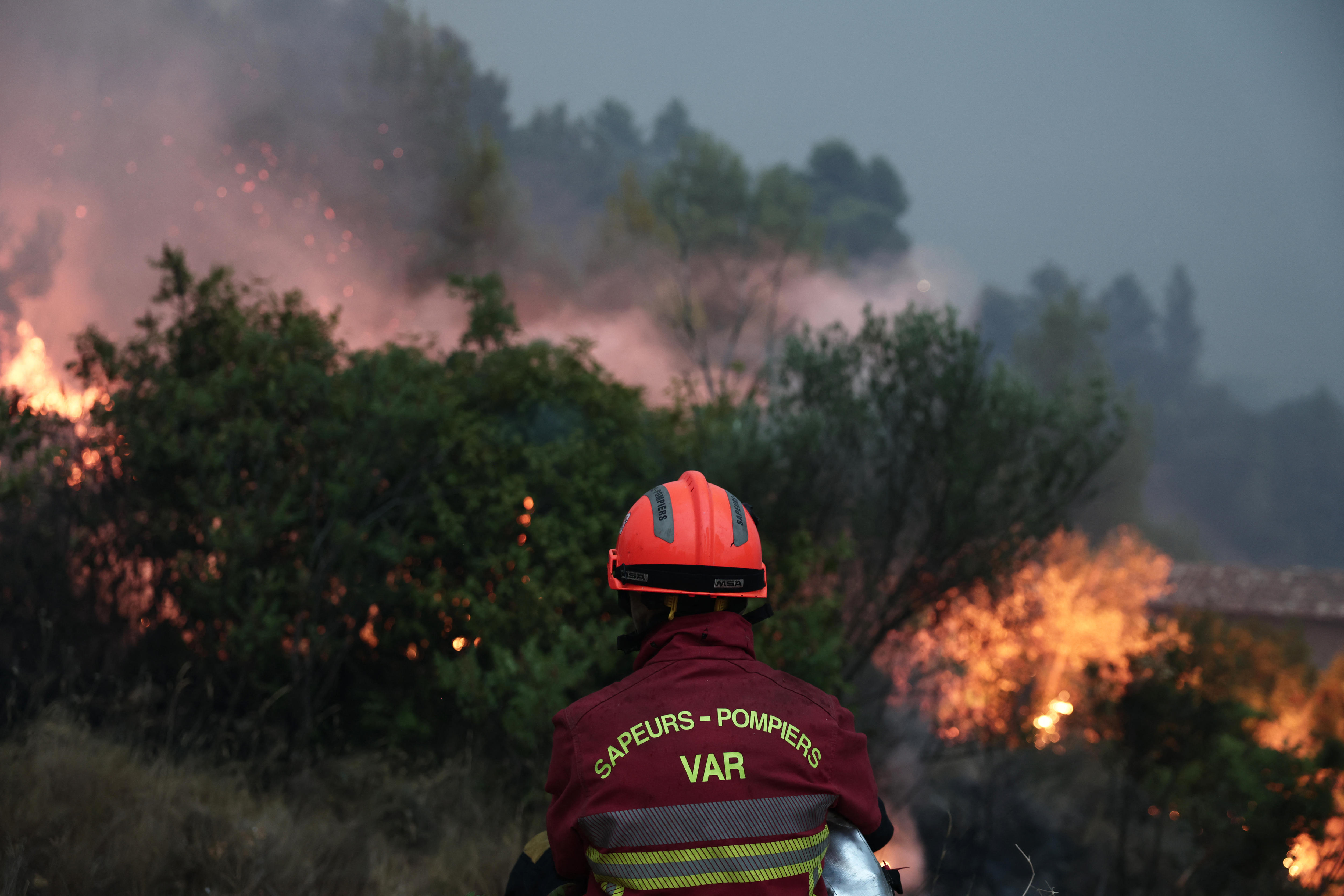 Wildfires force mass evacuations in Europe as Australia sends help