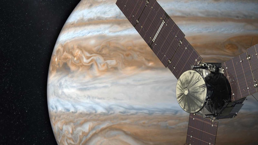 Artist's concept of NASA's Juno spacecraft with the gas giant Jupiter in the background