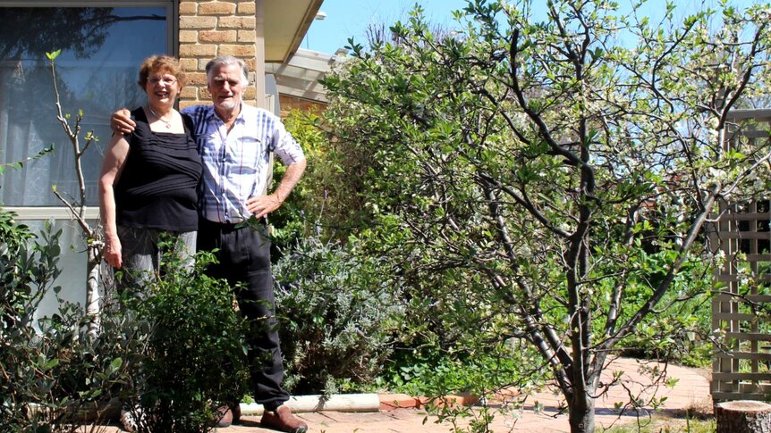 Patricia and Klaus Hueneke outside their home in Palmerston, 2017.