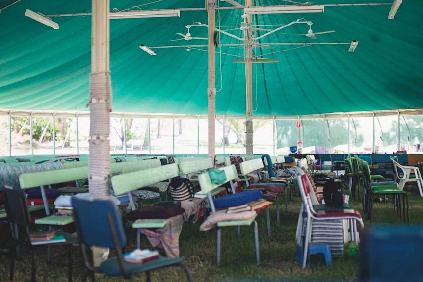 Chairs under a tent