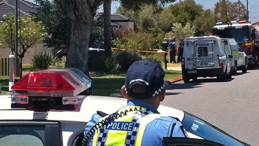 Police cordoned off the street after the fire in Cannington.