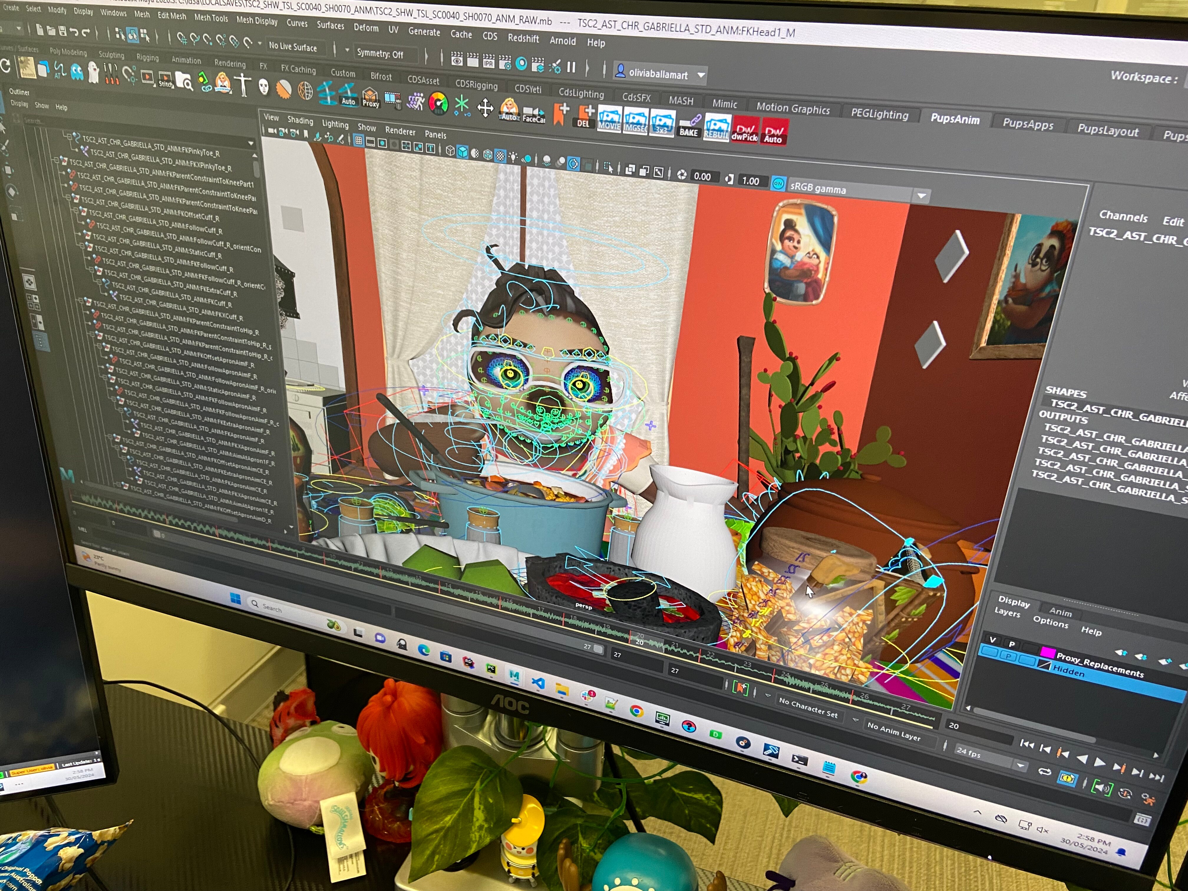 An animated character being created on a computer screen.