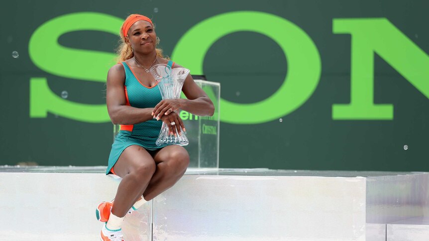 Familiar feeling ... Serena Williams shows off the Butch Buchholz trophy