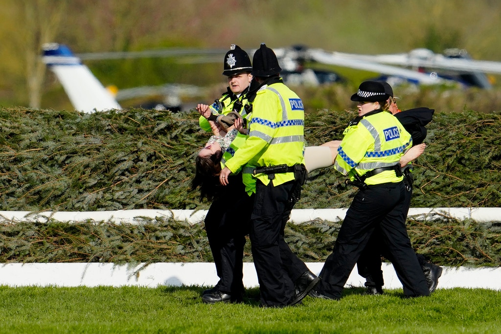 More than 100 animal rights activists arrested in UK, delaying Grand ...