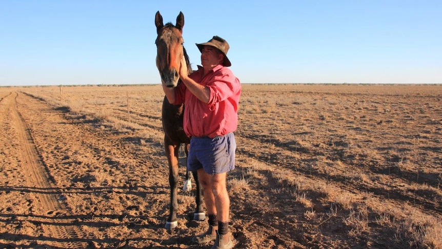 Cam Tindall, with horse 'Stromglad' at Darr River Downs