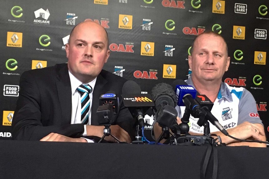 Chris Davies and Ken Hinkley at a news conference