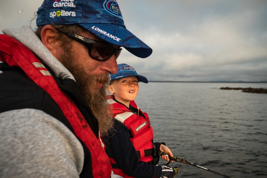 Sam Glowacki fishing with his dad on Great Lake.
