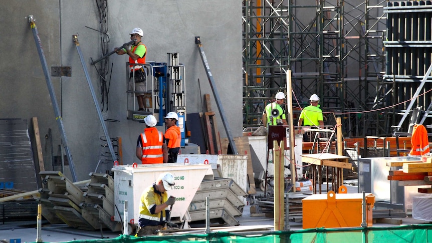 Construction workers on a building site in Southbank, Melbourne.