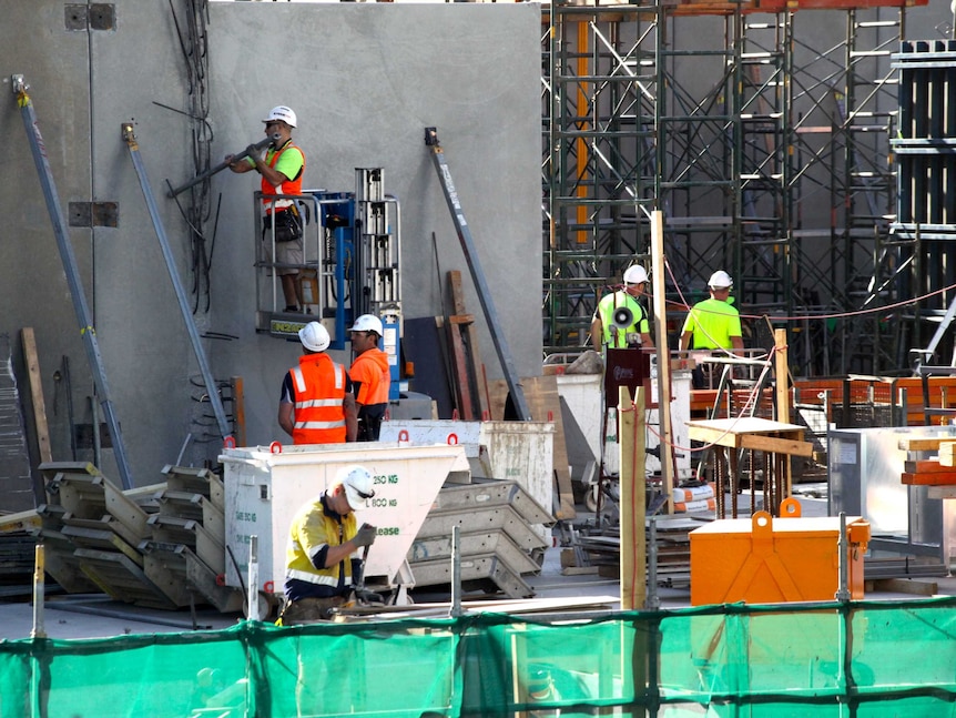 Construction workers on a building site in Southbank, Melbourne