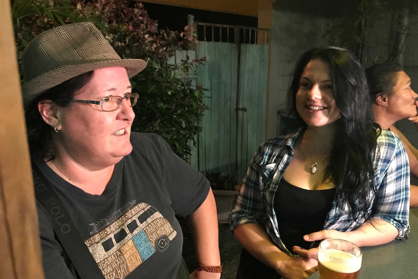 Two women in the beer garden of a pub in Townsville.