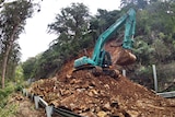 Kings Highway rockslide cleanup Monday, machine cleans up rockslide - April 23, 2012