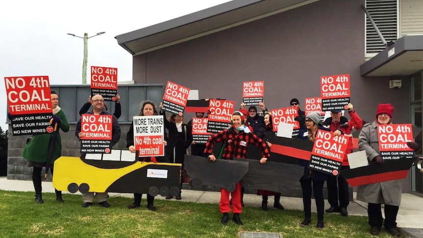 Opponents of the $5 billion T4 project outside a public hearing in Newcastle.