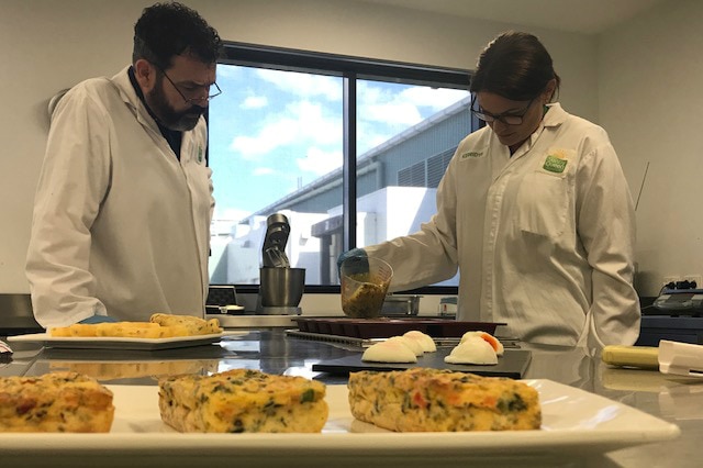 Chefs hard at work preparing omelettes and fritatas in the Sunny Queen kitchen.