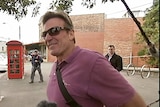 TV personality, Sam Newman leaves the South Melbourne police station.