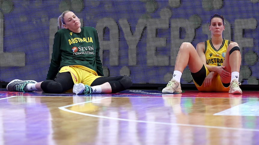 Lauren Jackson and Steph Talbot sit and look disappointed