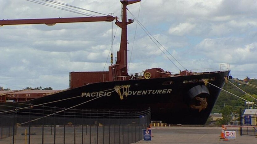 The damaged Pacific Adventurer remains moored at Hamilton in Brisbane.
