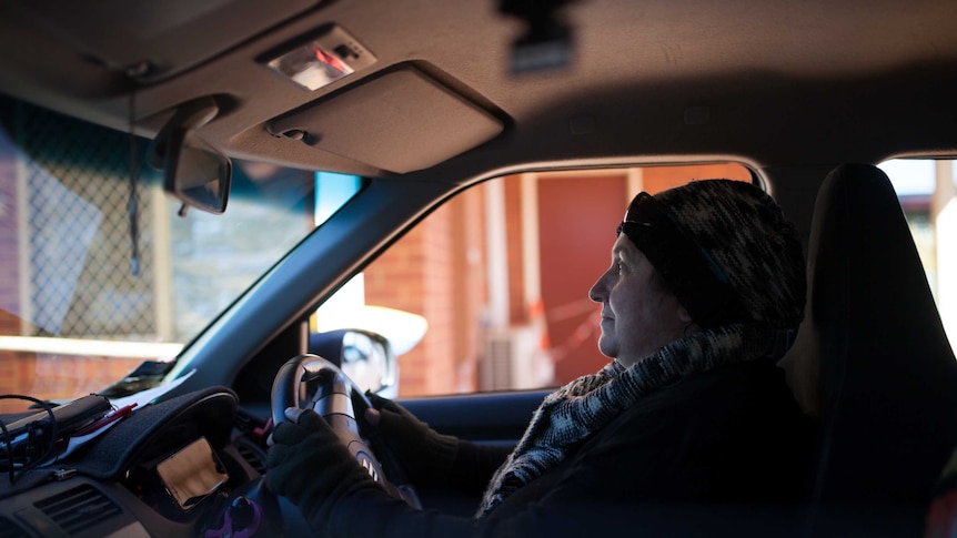 Cashless welfare card trial participant Sam Harding drives her car near her Kalgoorlie home.