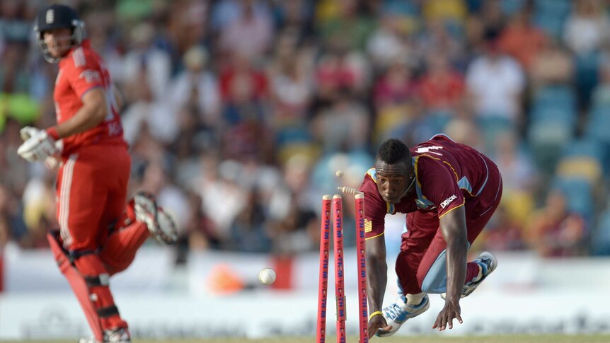 The West Indies' Andre Russell runs out England's James Tredwell in the first T20 international.