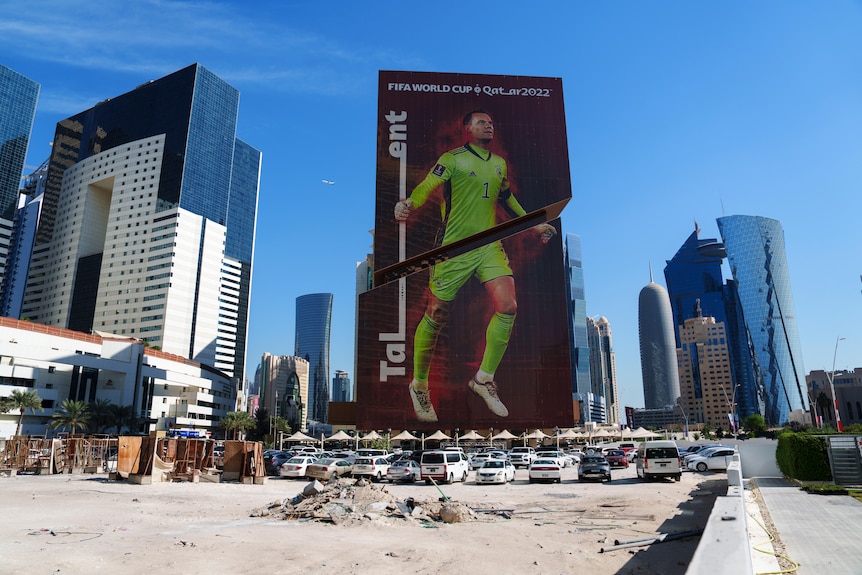 A construction cite is seen in front of a building with a Germany's goalkeeper Manuel Neuer's portrait