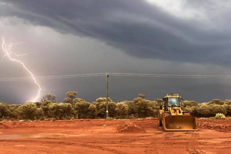 A lightning bolt near a mine vehicle.