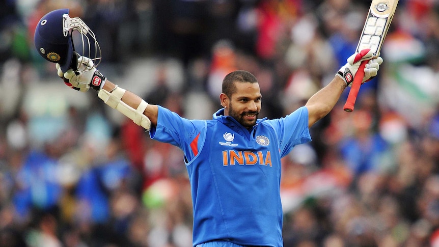 India's Shikhar Dhawan celebrates his century