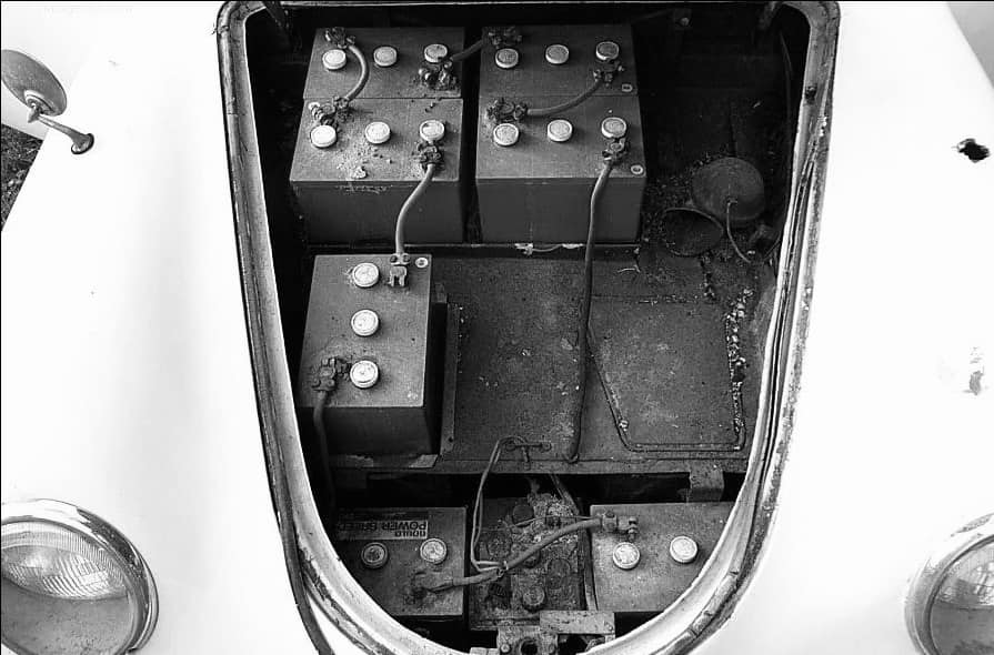 The lead-acid batteries in the trunk of the Porsche