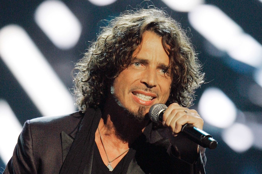 Chris Cornell performs in 2008 during Conde Nast's fashion show.