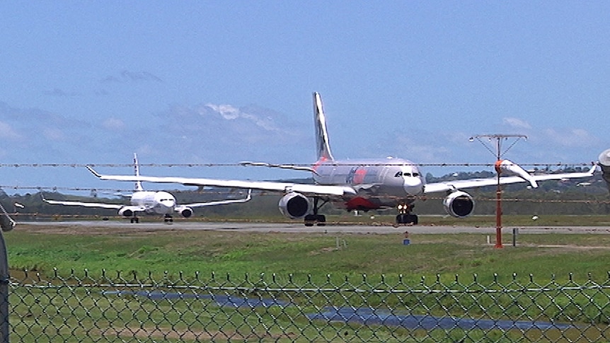 Planes queue for take-off at Gold Coast Airport