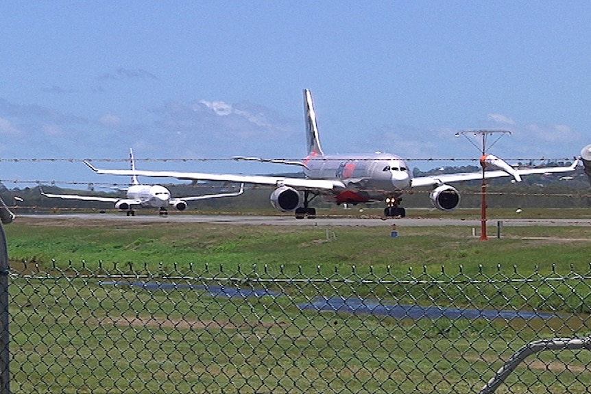 Planes queue for take-off at Gold Coast Airport