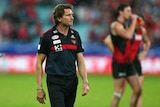 Essendon coach James Hird looks dejected after his team's loss to Sydney
