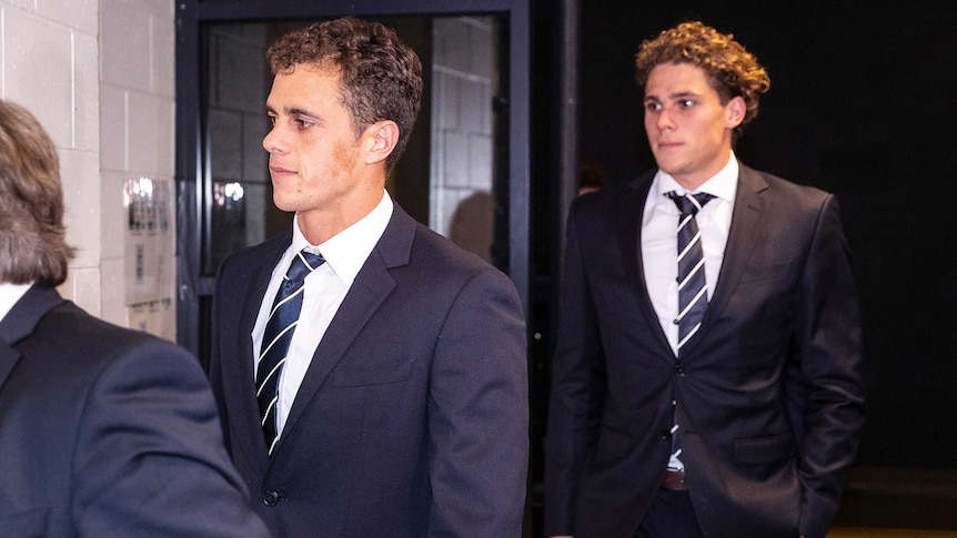 Ed and Charlie Curnow arrive at the AFL tribunal