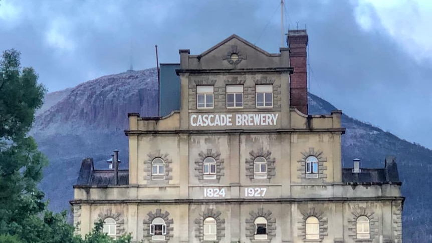 Hobart's Cascade Brewery with a snowy Mount Wellington/kunanyi backdrop.