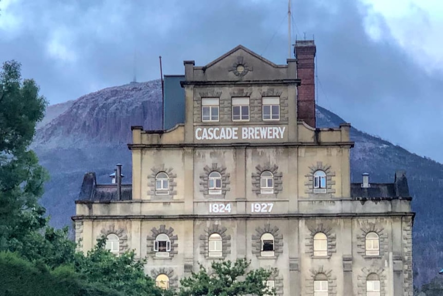 Hobart's Cascade Brewery with a snowy Mount Wellington/kunanyi backdrop.
